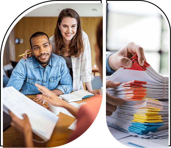 Two people collaborating on a project with colorful fabric samples.